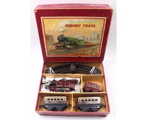 1929-30 Hornby No.0 Passenger set, clockwork, comprising Hornby loco &amp; tender LMS red No.500 with two No.0 Pullman coache
