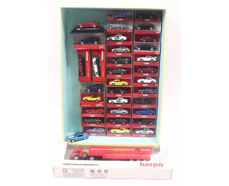 A quantity of Herpa 1/87 scale plastic miniature vehicles, the majority housed in original packaging