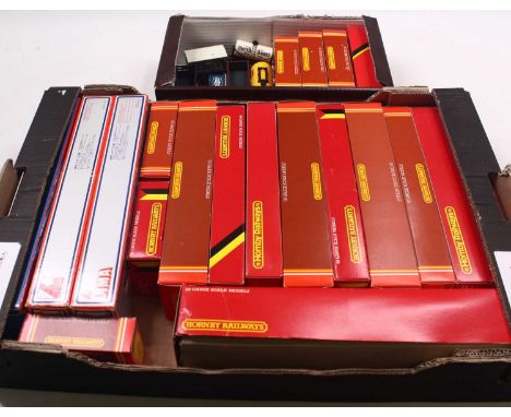 Two boxes of 00 gauge rolling stock to include a Hornby container wagon, Hornby teak coaches, Lima GWR coaches, 4 wheeled coa