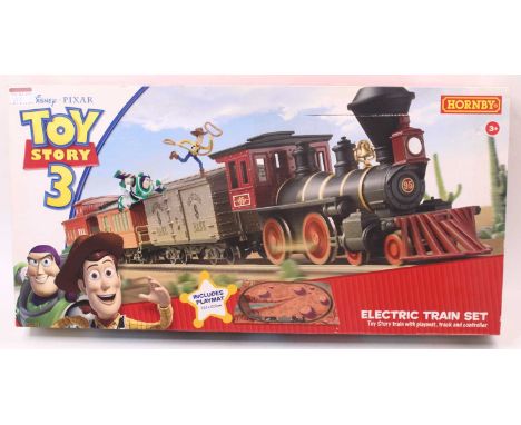 Hornby Toy Story 00 gauge train set, comprising a 4-4-0 American loco, a bank car, a coach, with Buzz and Woody figures, a ca