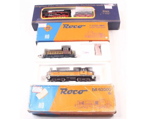 Three HO gauge Roco locos to include an SNCF BB63000 in orange and brown livery, an SNCF Y8000 loco tractor, repainted in bro