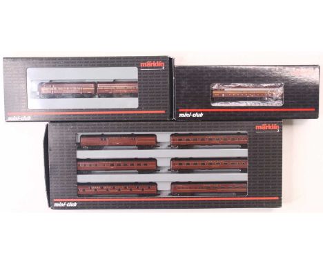 Two Marklin Mini Club Z gauge American locos in Pennsylvanian red and yellow livery, including an E8A Diesel electric loco, a