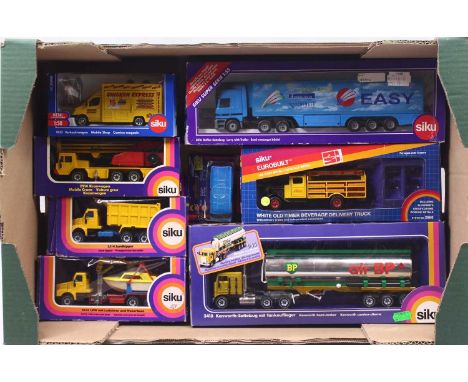 One tray containing 8 boxed Siku commercial interest diecast vehicles to include No. 2814 lorry with crane and boat load, No.
