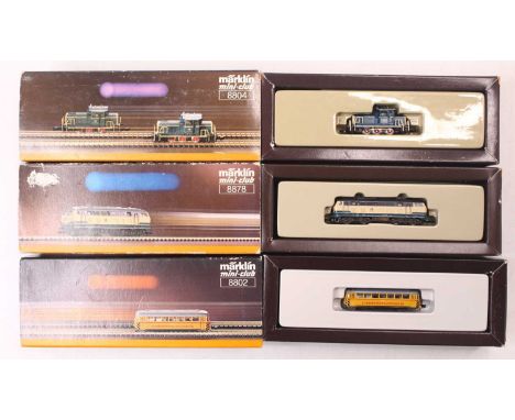 Three Marklin Mini Club Z gauge locos to include a DB BR 218 class in cream and blue, a DB BR 260 class in blue and cream, an