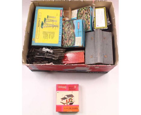 One box containing mainly Trix Twin 00 gauge locos, coaches, wagons, and accessories, mostly unboxed, to include two locos, a