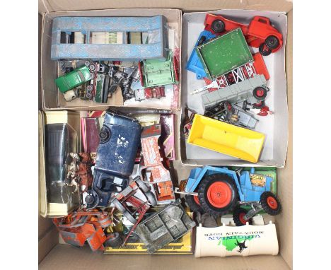A quantity of mixed spare parts and components for diecast models to include a Moko crawler tractor with blade, Moko Prime Mo