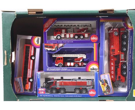 One tray containing five various boxed Siku Emergency Service related diecast miniatures to include No. 4110 hydraulic crane 