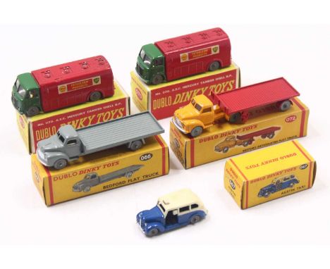 Five Dublo Dinky Toys: 070 AEC Shell/BP Mercury Tanker red &amp; green, with windows (M) (BM); another (NM) (BNM); 066 Bedfor