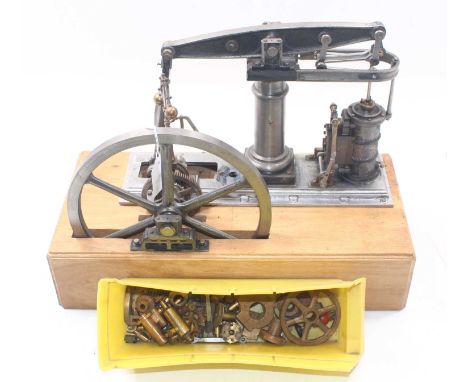 Part completed scratch-built stationary beam engine, comprising a single cylinder, a 10" beam, and a 9" flywheel, mounted on 