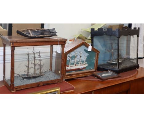 Three 19th/20th century cased model boats, model rowing boat and a silk painting