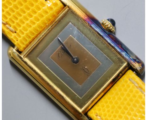 A lady's 925 gilt white metal Must de Cartier manual wind wrist watch.