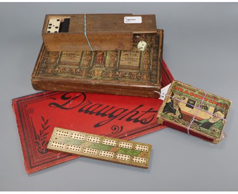 A Richter 'Anchor Box' set of building stones, No. 4A, a set of ebony and bone dominoes, a cribbage board, etc.