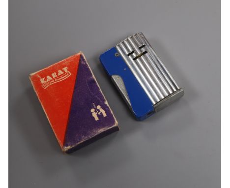 A World War II Karat lighter, boxed