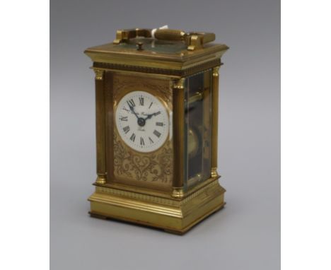 A Charles Frodsham brass repeating carriage clock
