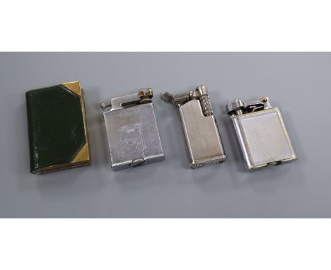 A novelty book lighter and three others