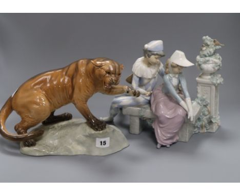 A Beswick model mountain lion and a Nao figure group