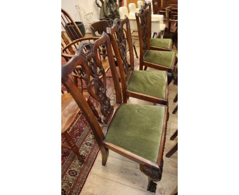 Six 1920's Chippendale style chairs, two with arms