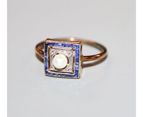 An Art Deco yellow metal, sapphire diamond and cultured? pearl set tablet ring, size K.