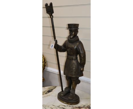 A novelty cast metal Beefeater lamp (lacking fitments) H.81cm