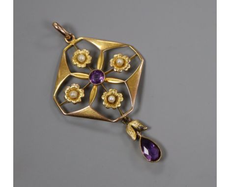An early 20th century 9ct, amethyst and seed pearl drop pendant, 44mm.