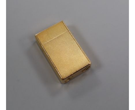A Flamidor gold painted lighter
