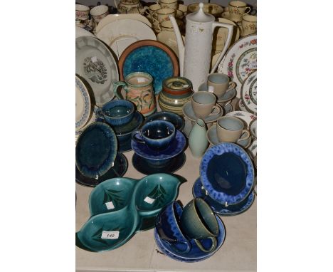 Studio Pottery - a part stoneware tea set, mottle decorated in tones of blue and green, comprising cups and saucers, sugar bo