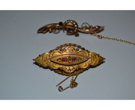 A Victorian five stone diamond and ruby brooch, five alternating diamonds and rubies, set to a raised marquise platform,  und