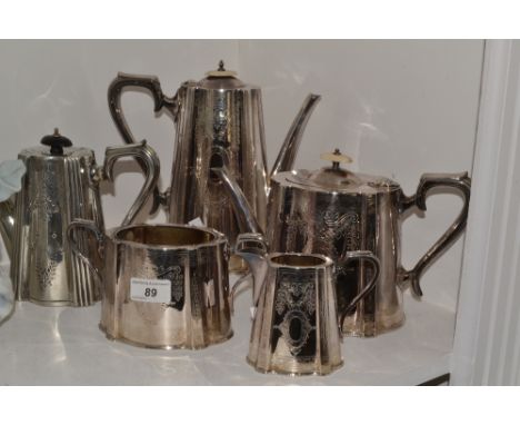 A silver plated Walker and Hall coffee pot, engraved with floral swags, ivory finial; a silver plated Walker and Hall tea pot