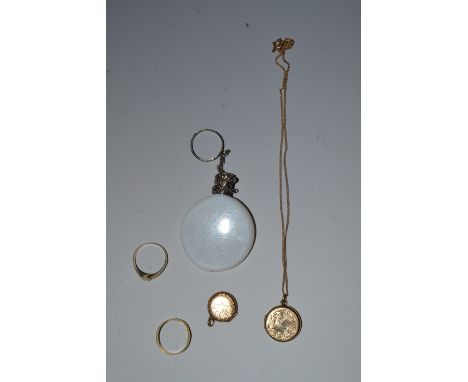 A 9ct gold and opal ring, a 9ct gold wedding band, a 9ct gold locket and chain a scent flask 