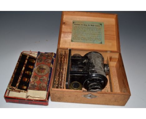 A W P & S Excelsior portable Magic lantern, boxed with 25 assorted slides including coloured Nursery Tales part boxed
