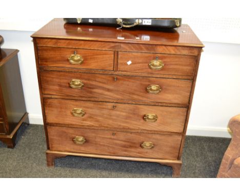 A late Victorian mahogany chest of drawers, the two short over three long drawers, brass swing handles, bracket feet