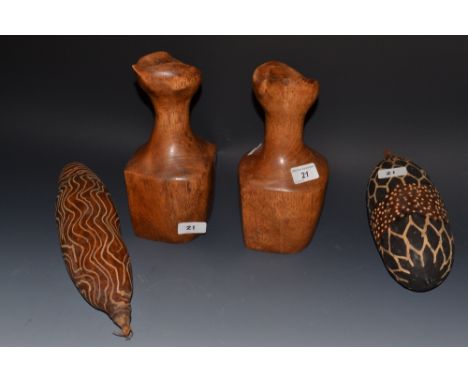 Tribal art - an African rain dance shaker;  another;  a pair of treen candlestick (4)