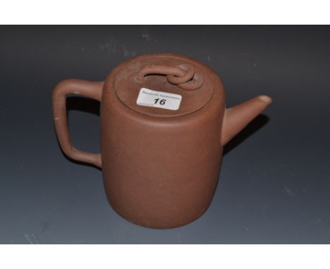 A Chinese Yiking teapot, incised with character marks , twin ring loops, 15cm high