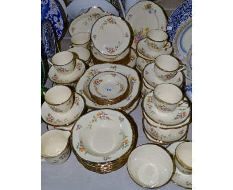 An Alfred Meakin Marquis shape Marigold pattern tea and dessert service, comprising eleven  cups, saucers and side plates one