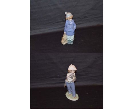 Two Nao Figurines 'Girl with Dog' and 'Boy with Satchel'