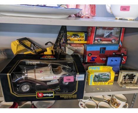 Mixed toys boxed and loose to include boxed Burago model of a Mercedes, boxed Corgi and othersLocation: 