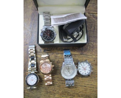 A boxed digital video watch, a Watch Time watch, an Eton quartz watch, a copy of a Breitling Chronometre Navitimer watch, and