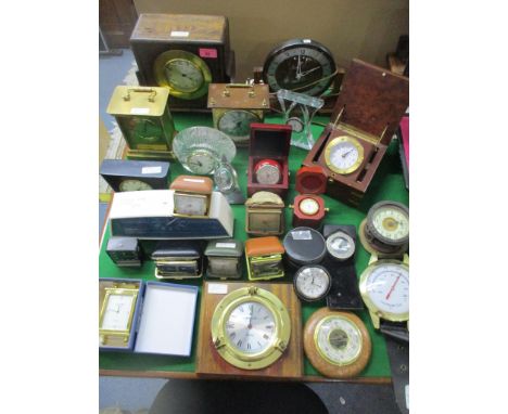 A mixed lot of mantel clocks, dressing table travel clocks, a William Widdop quartz carriage clock, a barometer, and other cl