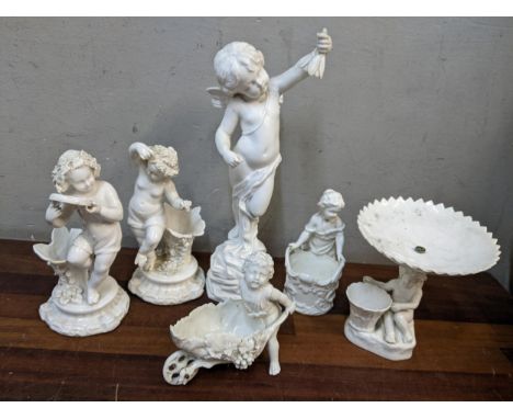 Fiver 19th century and later blanc de chine ornaments to include a large Copeland and Spode figure of a cherub, 29.5cm highLo