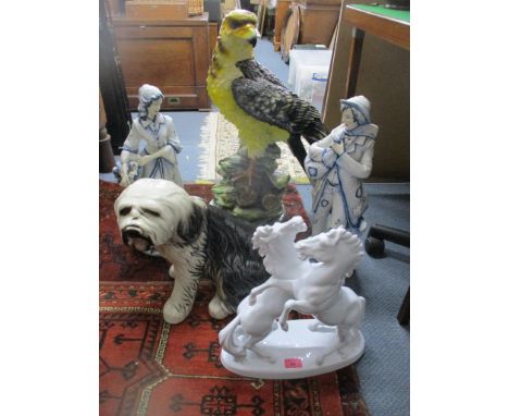 A selection of ceramic figurines and animals models and others to include a Keramos Viennese art ceramics model of two rearin