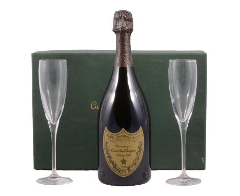 Moët et Chandon, Cuvée Dom Perignon Champagne, 1990 vintage, 12.5% vol, 75cl. presented in a box with two champagne flutes.
