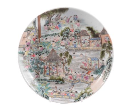 Chinese porcelain polychrome dish with playful figures in a garden, Qing dynasty, six-character mark in double circle, 26cm d