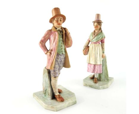 James Hadley for Royal Worcester, a pair of figures, Welsh Man and Woman, model 1875, circa 1911, painted in floral costumes,