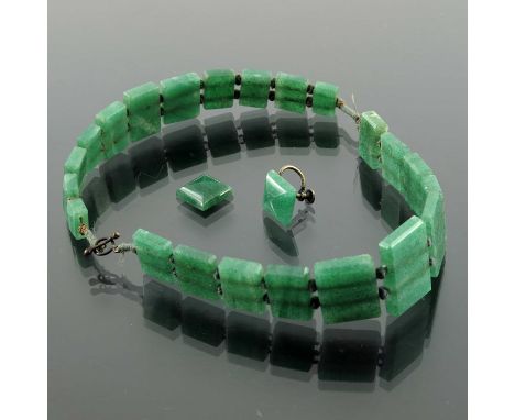 A suite of Jade jewellery, including bracelets and ring, rectangular plaques