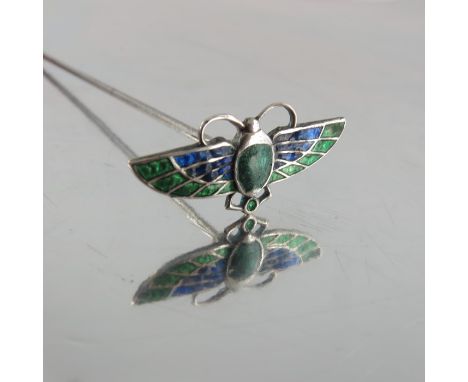 Charles Horner, an Arts and Crafts silver and enamelled hat pin, Chester 1909, in the form of an Egyptian scarab, blue and gr