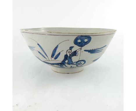 18th Century English delftware pottery blue and white footed bowl,  decorated with a figure in continuous trellis, flowering 