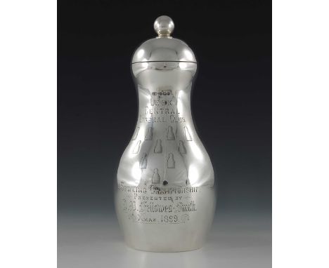 A Victorian novelty silver tea caddy, Stevenson and Law, Sheffield 1899, in the form of a bowling pin, inscribed for the Leek