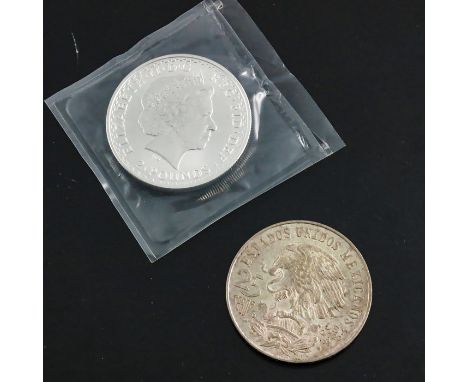 A Britannia silver bullion coin 1998, together with a Mexico 25 pesos Olympics coin 1968 (2)