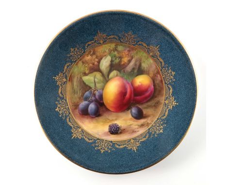 Horace Price for Royal Worcester, a fruit painted cabinet plate, 1926, within a gilt foliate and trellis border on powder blu