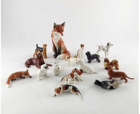 A collection of Royal Worcester figures, including dogs and foxes (16)